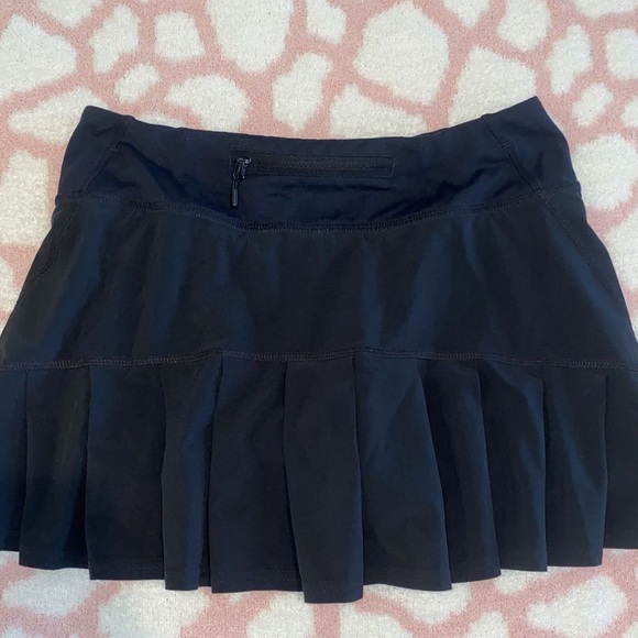 lululemon athletica Dresses & Skirts - RARE black ruffle Lululemon skirt Size 2!! (not sure the style)